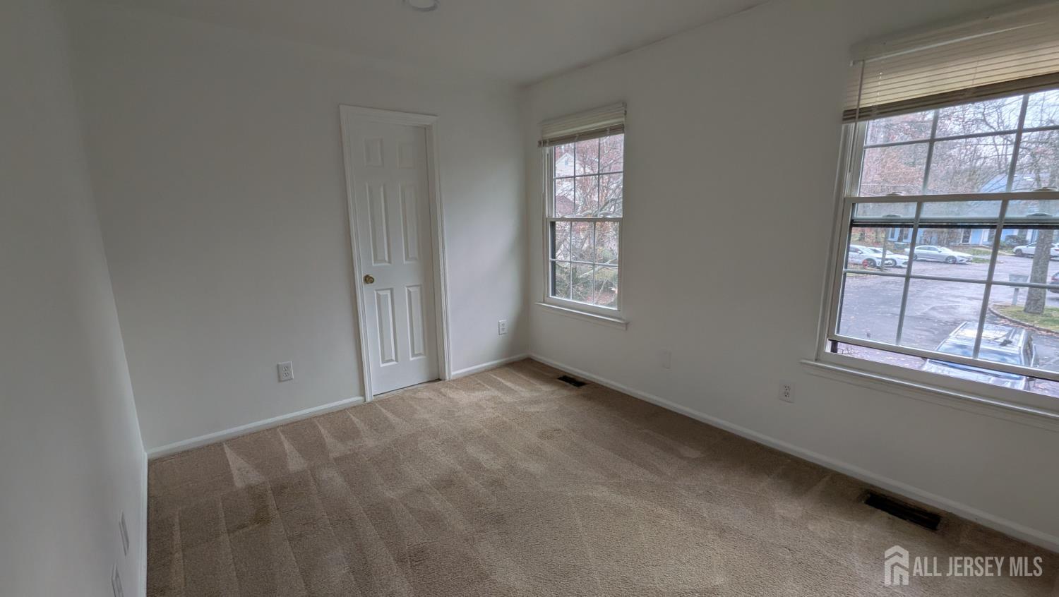 2103 Timber Oaks Road Edison, NJ 08820 - Photo 10 of 14 an empty room with windows