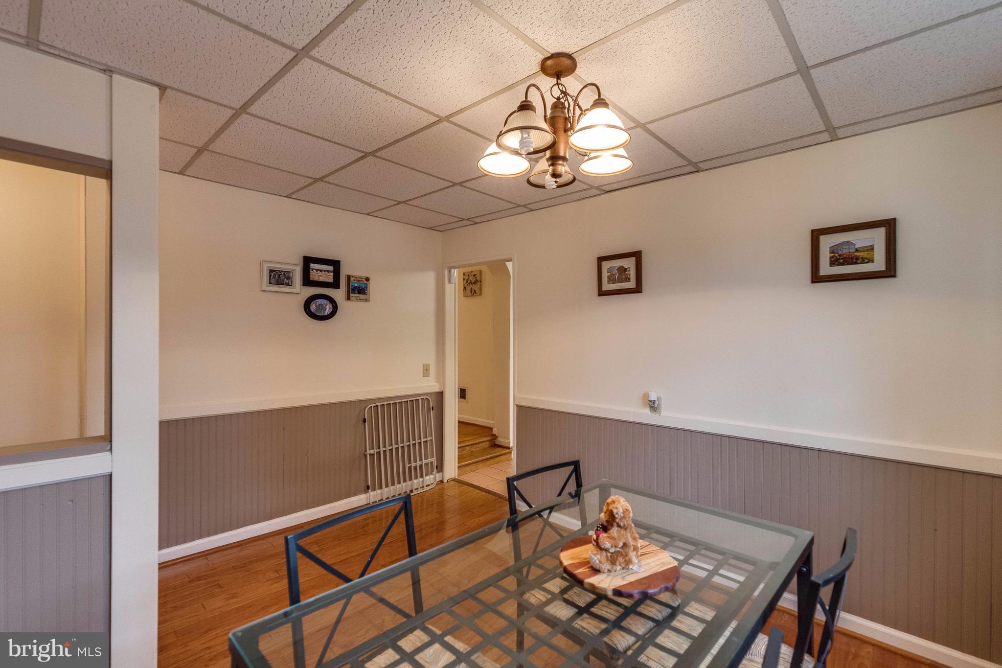 25453 Highfield Road Cascade, MD 21719 - Photo 13 of 30 a view of a livingroom with a table and chairs