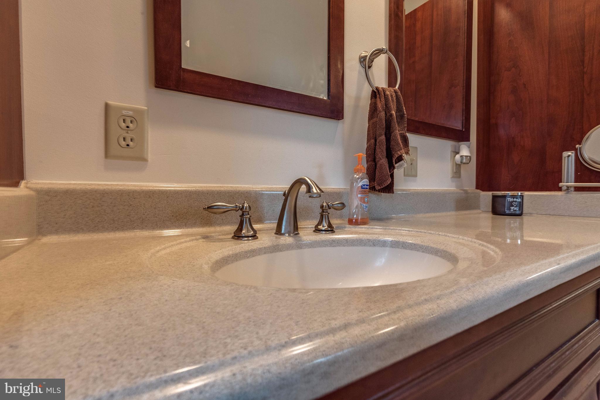 25453 Highfield Road Cascade, MD 21719 - Photo 20 of 30 a bathroom with a sink and a mirror