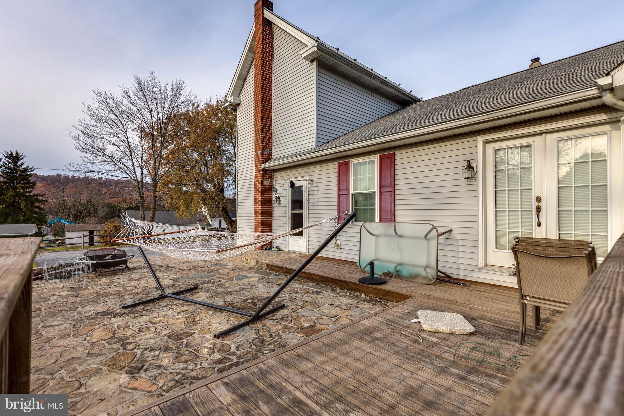 25453 Highfield Road Cascade, MD 21719 - Photo 6 of 30 a view of a house with backyard and sitting area