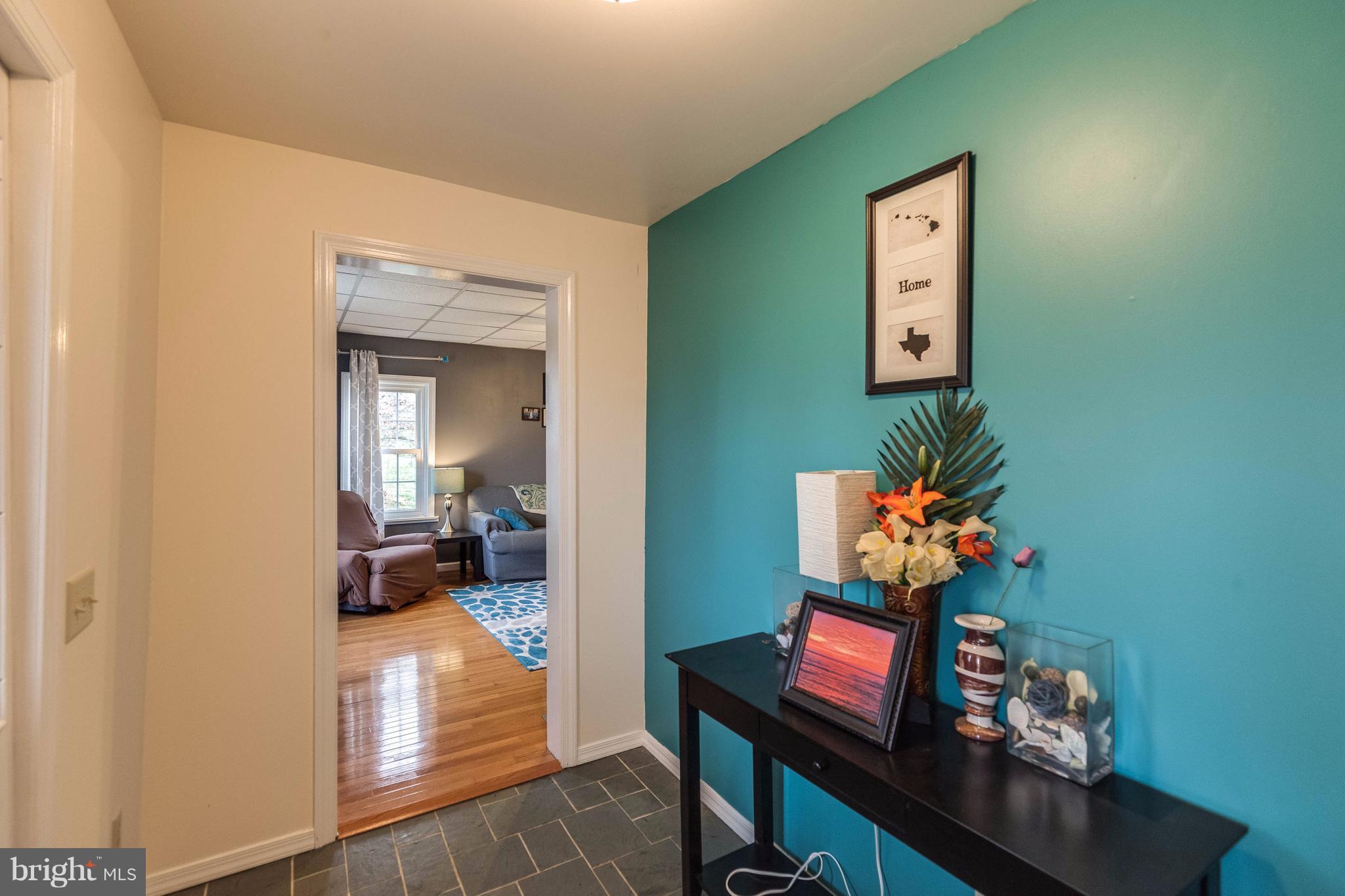 25453 Highfield Road Cascade, MD 21719 - Photo 8 of 30 a room with furniture and wooden floor