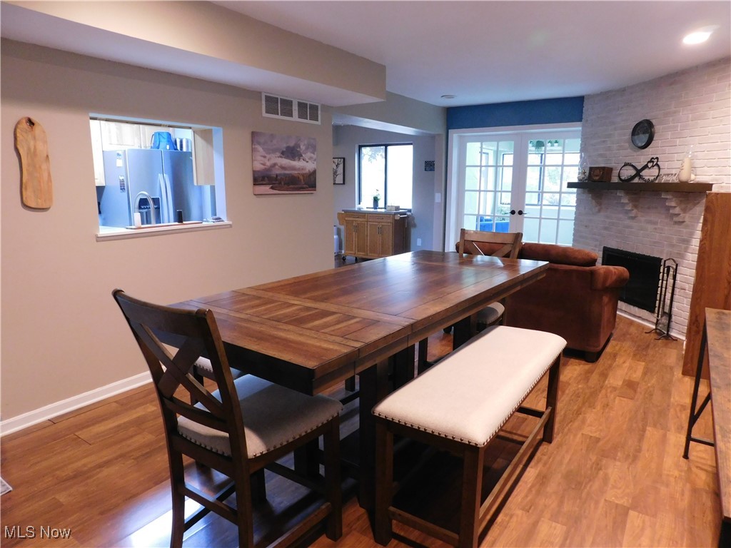 987 Hampton Ridge Drive Akron, OH 44313 - Photo 3 of 49 Spacious Family room gives the option for a dining space that opens to all season Florida/Sunroom