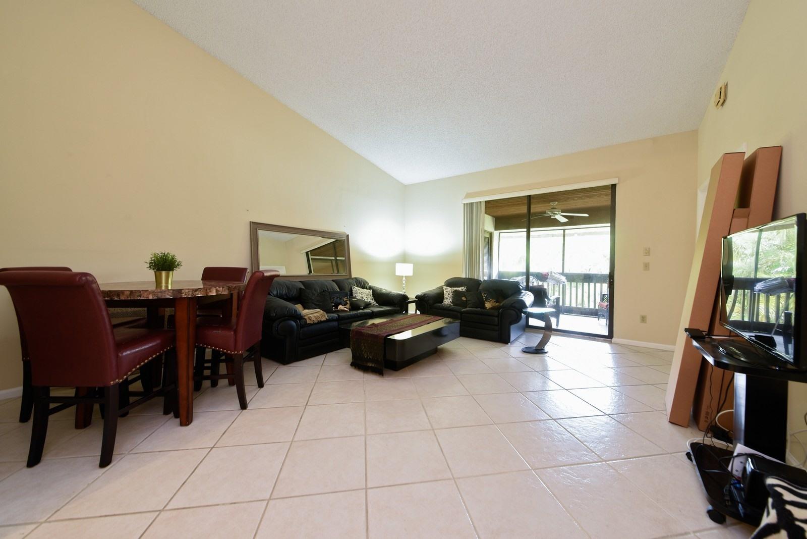 9346 Sable Ridge Circle, Unit D Boca Raton, FL 33428 - Photo 3 of 15 03_9346SableRidgeCircle_1_LivingRoom_Cus