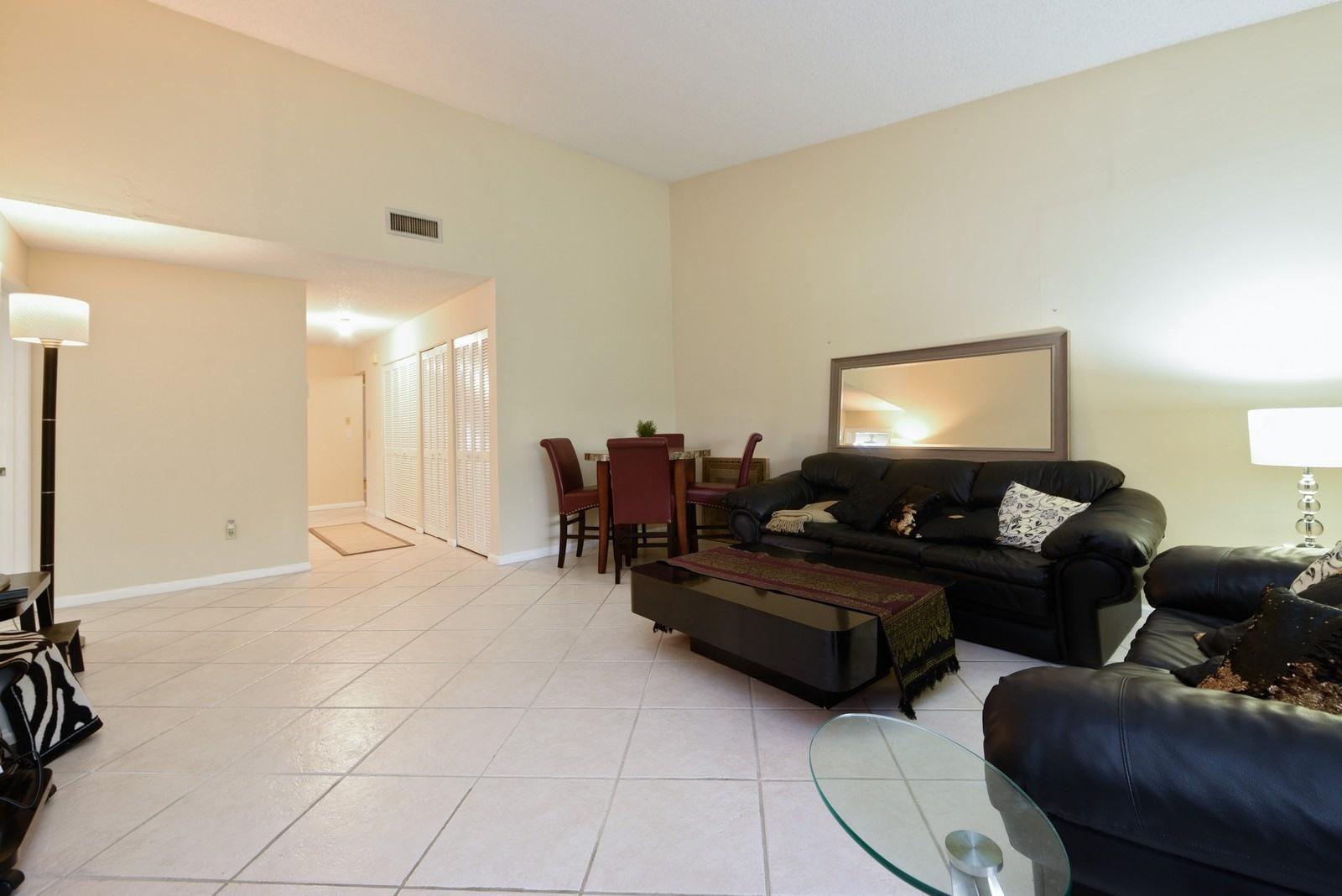 9346 Sable Ridge Circle, Unit D Boca Raton, FL 33428 - Photo 4 of 15 04_9346SableRidgeCircle_10001_LivingRoom