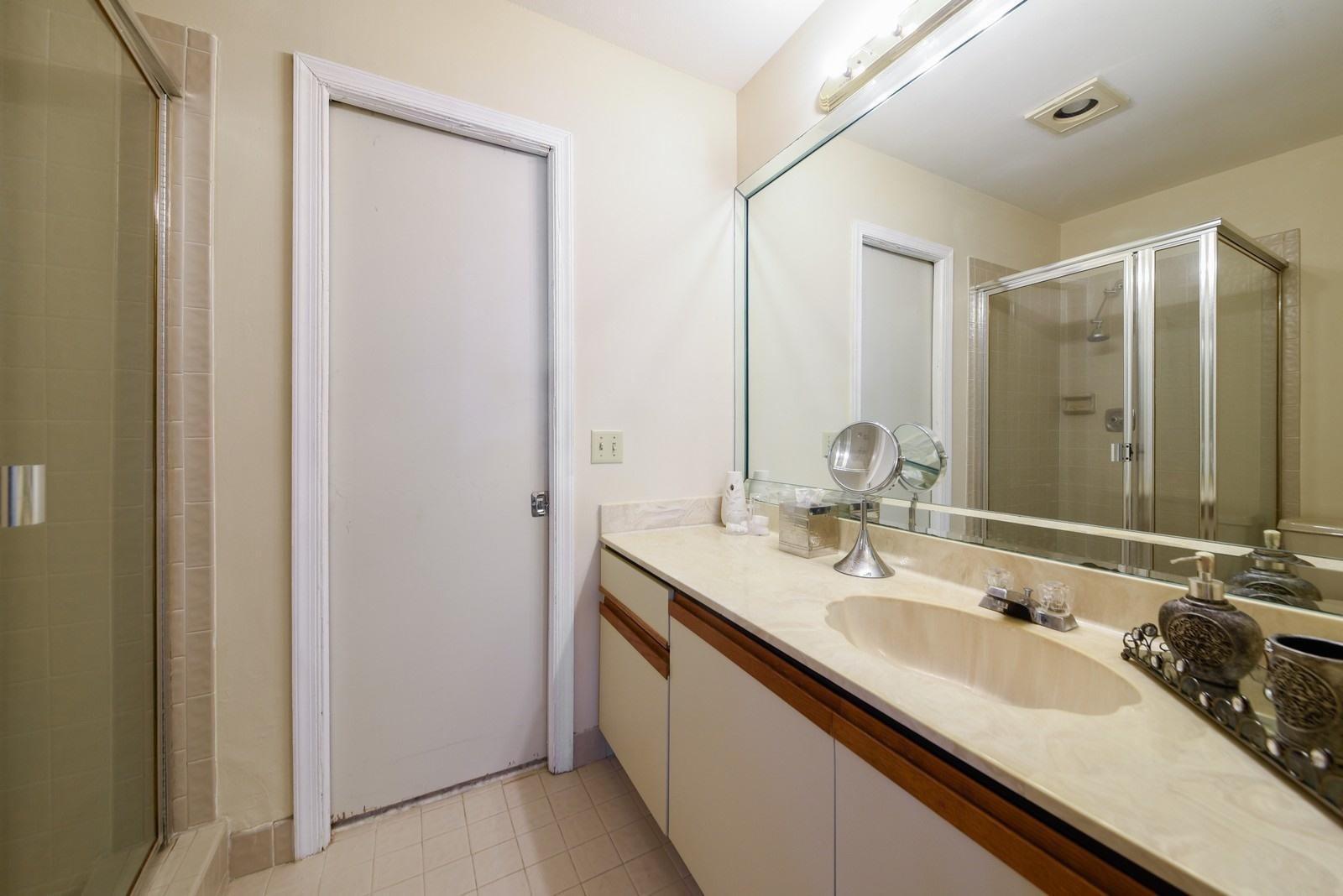 9346 Sable Ridge Circle, Unit D Boca Raton, FL 33428 - Photo 10 of 15 10_9346SableRidgeCircle_8_Bathroom_Custo