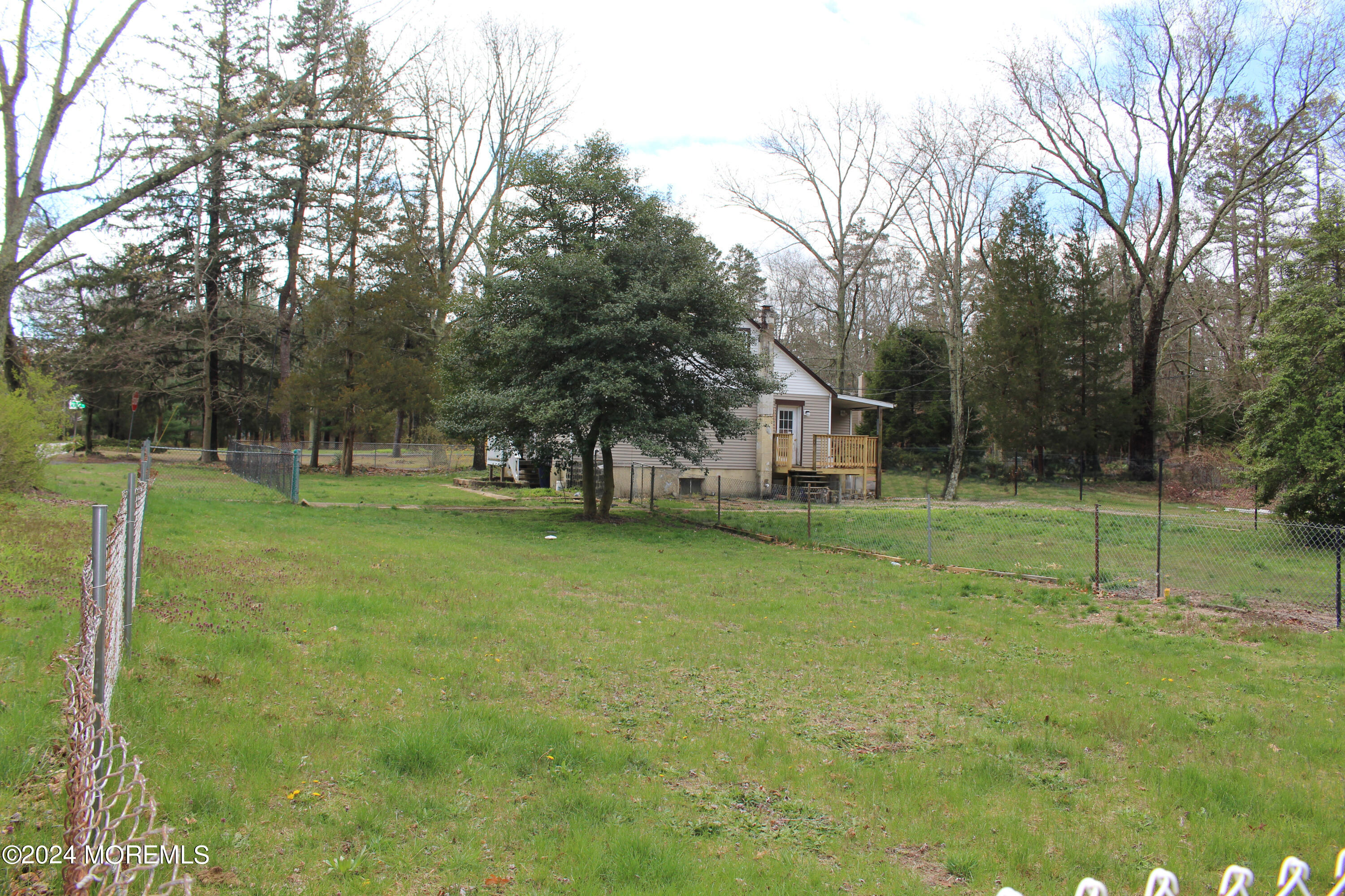 46 Toms River Road Jackson, NJ 08527 - Photo 14 of 16 a view of house with a backyard