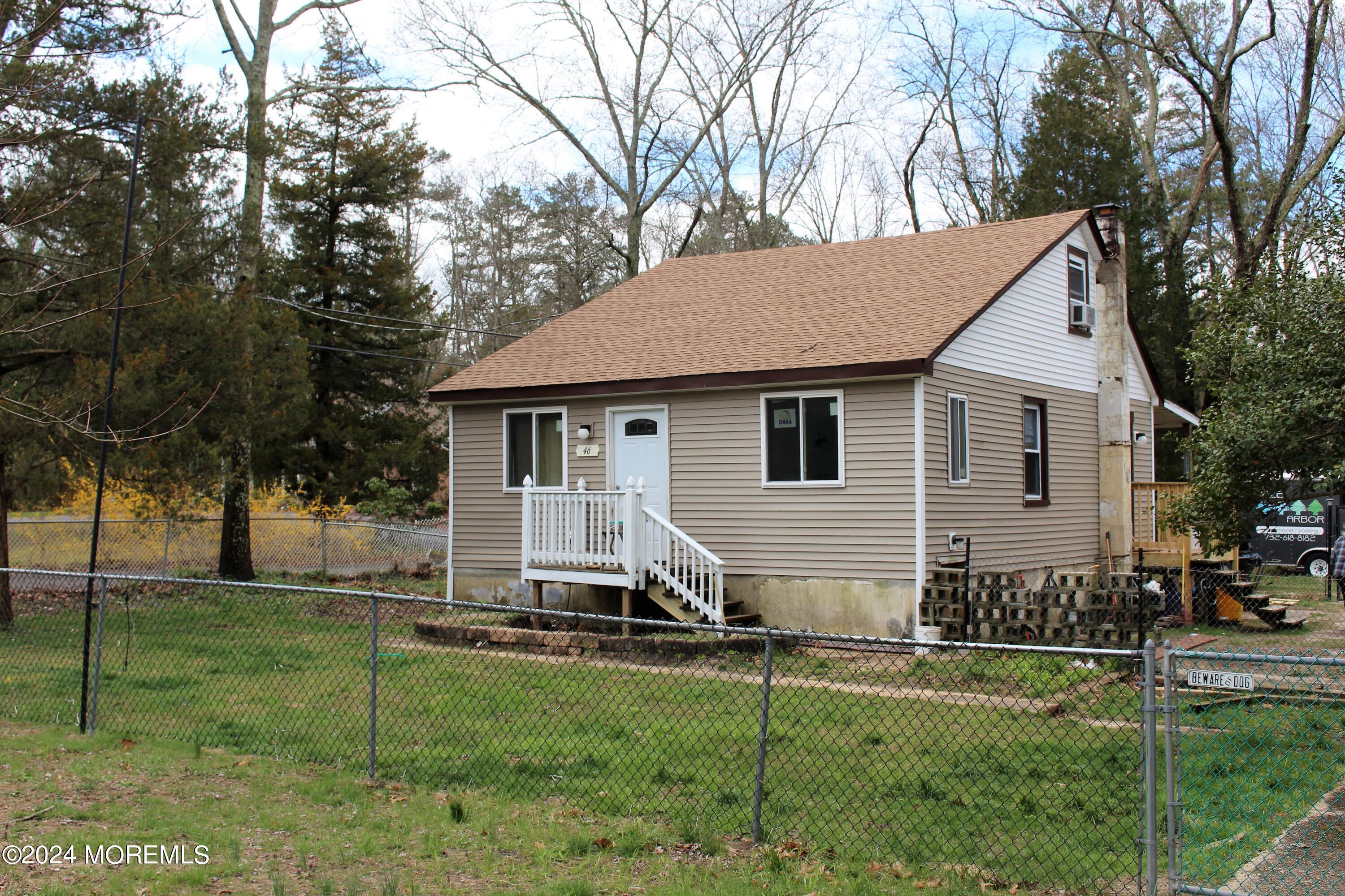 46 Toms River Road Jackson, NJ 08527 - Photo 2 of 16 a view of a house with backyard