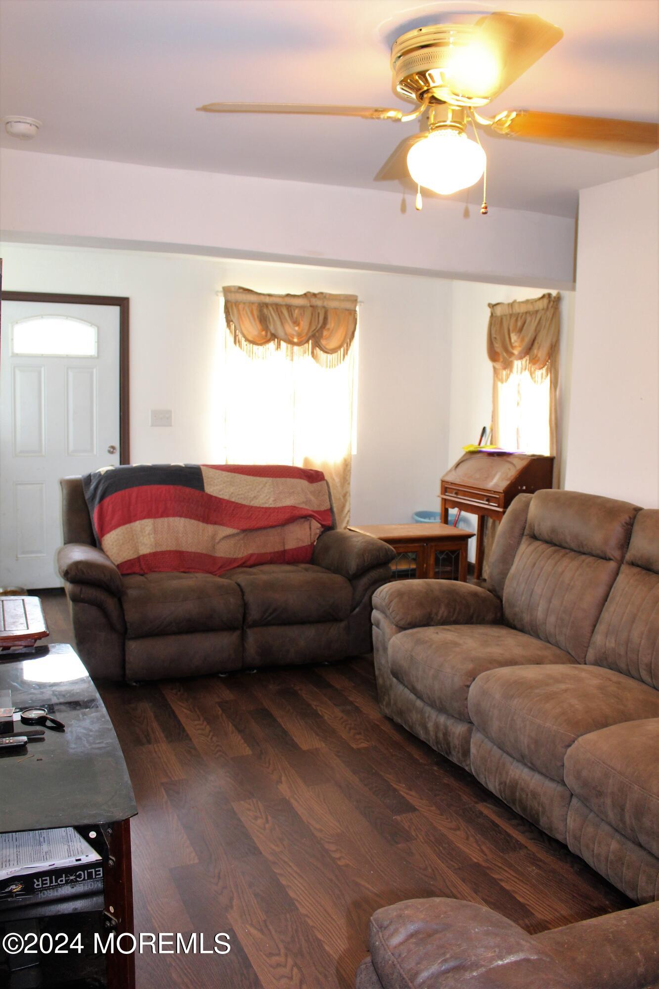 46 Toms River Road Jackson, NJ 08527 - Photo 6 of 16 a living room with furniture and a window