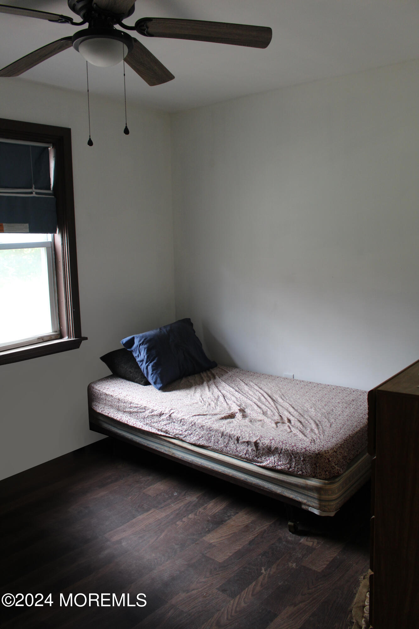 46 Toms River Road Jackson, NJ 08527 - Photo 7 of 16 a bedroom with a bed and a tv