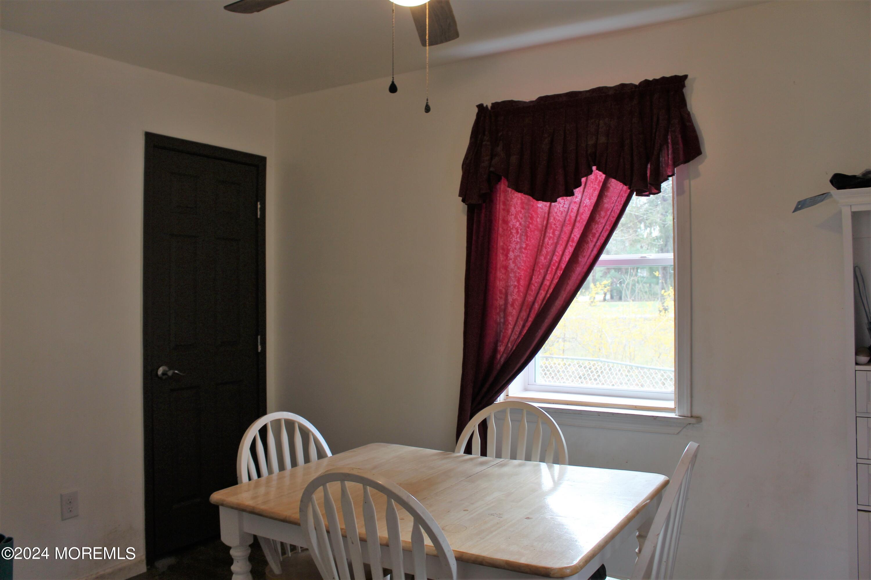 46 Toms River Road Jackson, NJ 08527 - Photo 10 of 16 a view of walk in closet with clothes and shoes