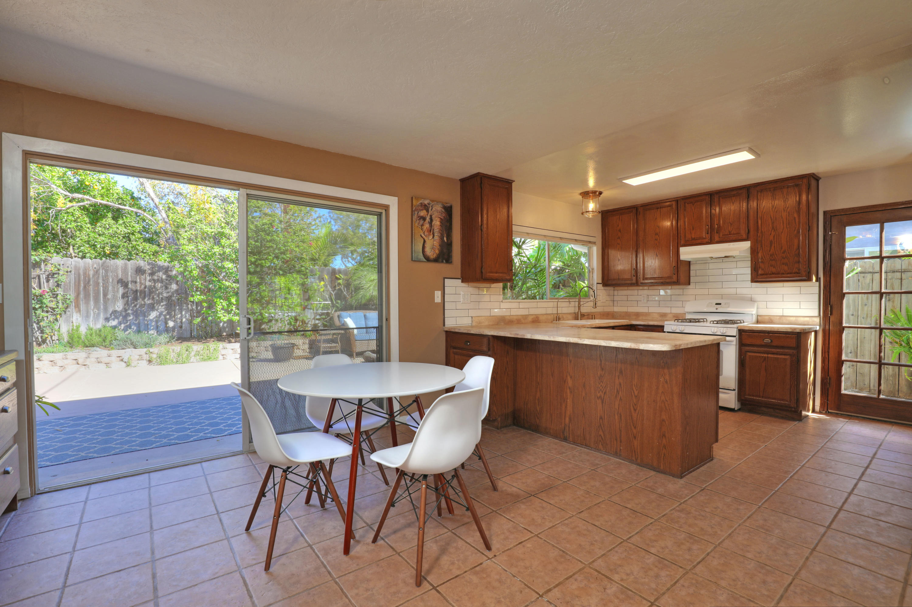 670 Ripley Street Santa Barbara, CA 93111 - Photo 5 of 23 Dining looking towards yard & kitchen