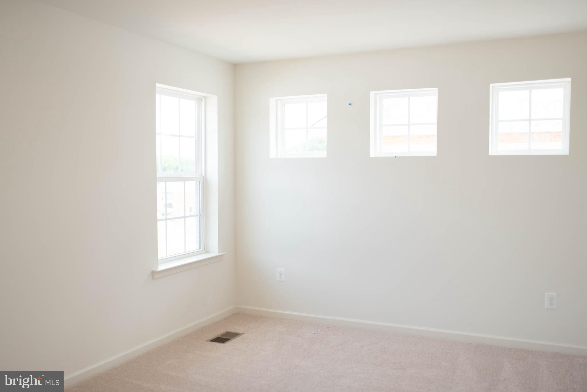 919 Morgan Run Road Baltimore, MD 21220 - Photo 11 of 16 an empty room with windows