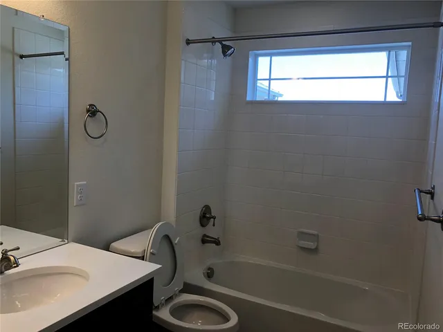 a bathroom with a sink and a bathtub