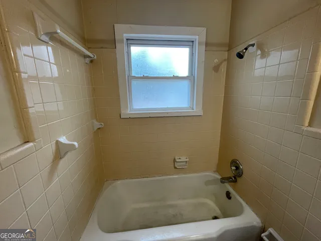 a bathroom with a bathtub