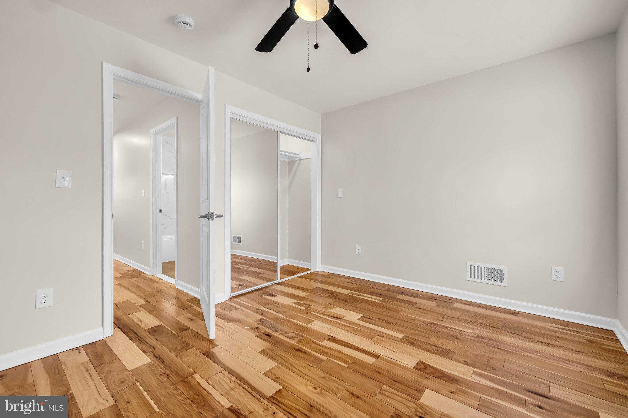 1622 Hazel Street Baltimore, MD 21226 - Photo 18 of 40 Bright and airy room with wood floors.