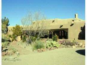 150 Haasville Road Anthony, NM 88021 - Photo 1 of 1 a front view of a house with a yard