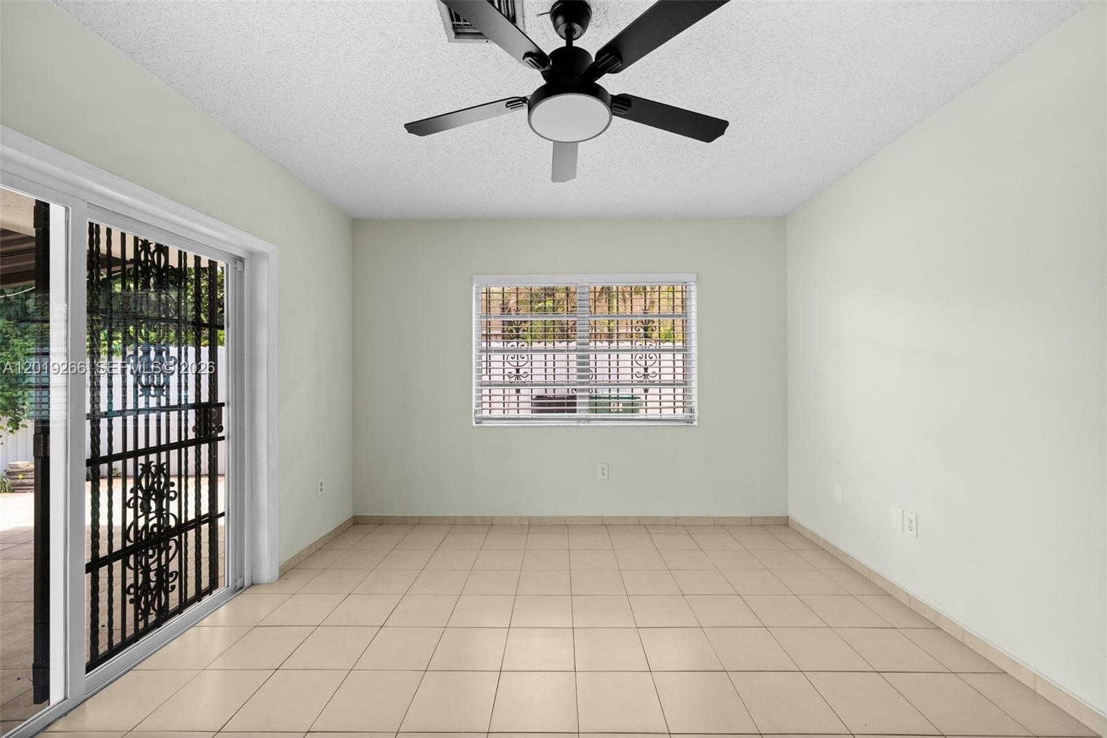 13 Southwest 97th Place Miami, FL 33174 - Photo 15 of 29 a view of an empty room with a window