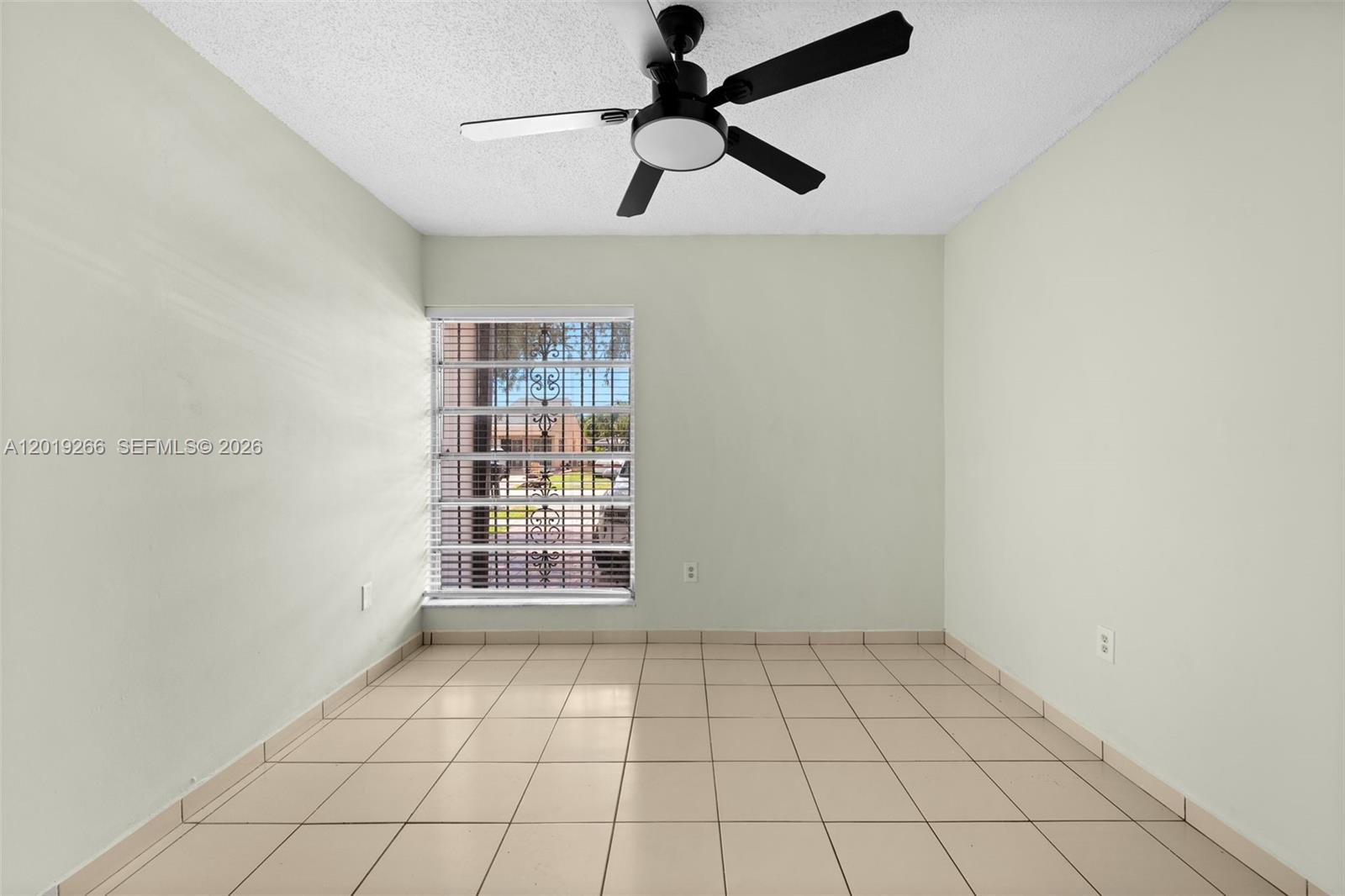 13 Southwest 97th Place Miami, FL 33174 - Photo 20 of 29 a view of an empty room with a window