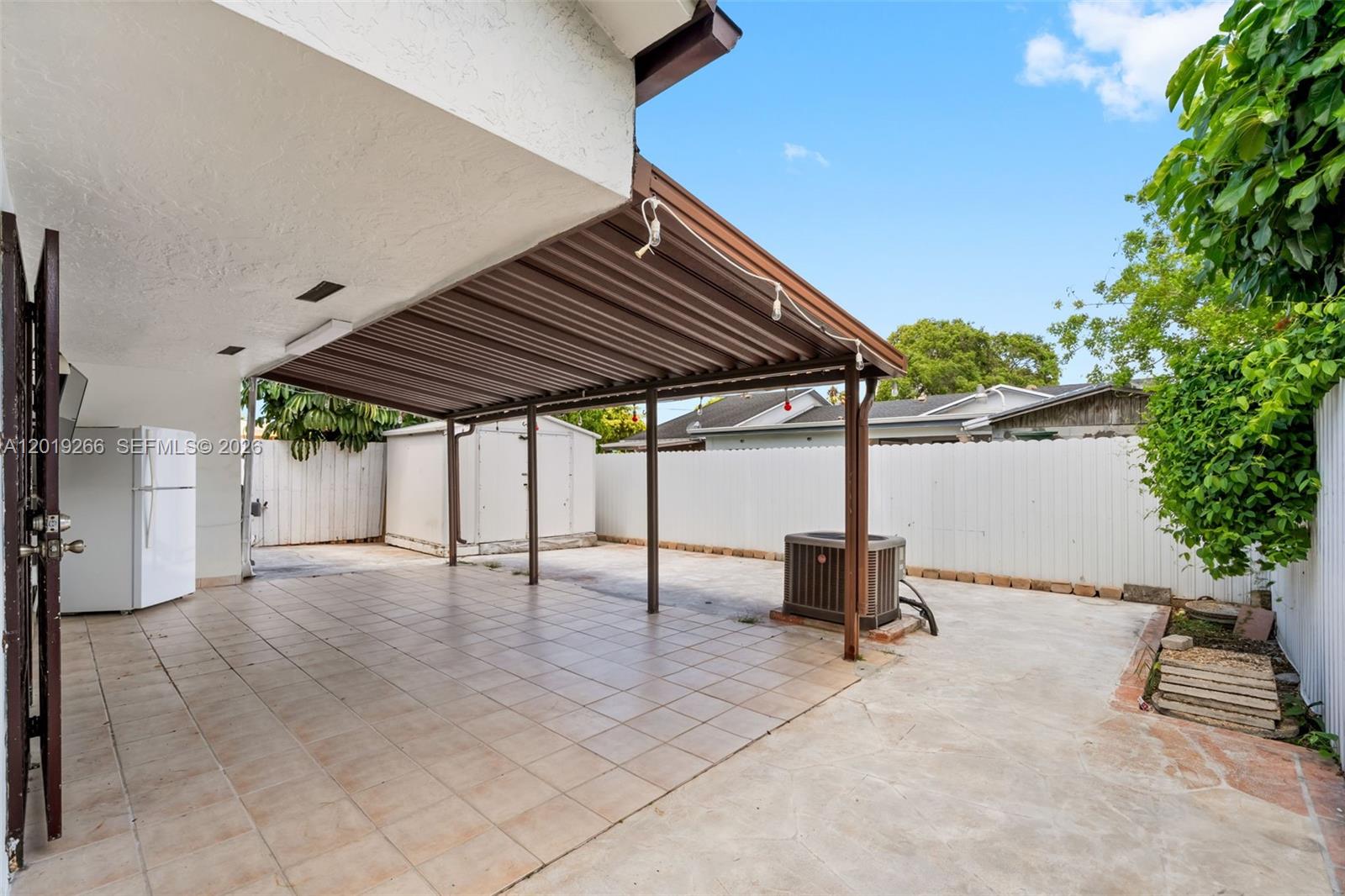 13 Southwest 97th Place Miami, FL 33174 - Photo 27 of 29 a view of a lounge chairs in the patio