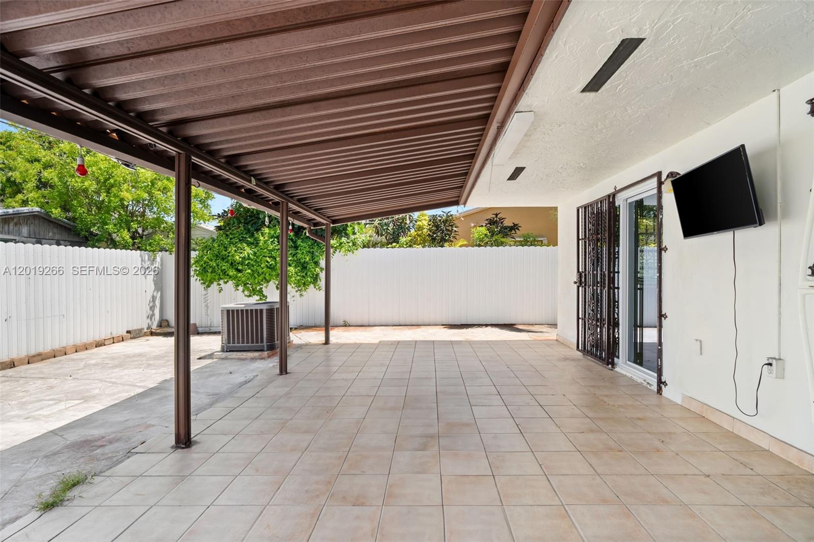 13 Southwest 97th Place Miami, FL 33174 - Photo 28 of 29 a view of backyard with furniture