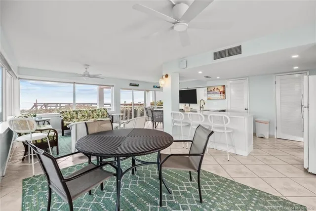 a view of a chairs and table on the terrace