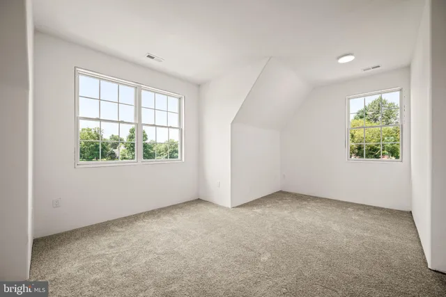 a porch with seating space and yard