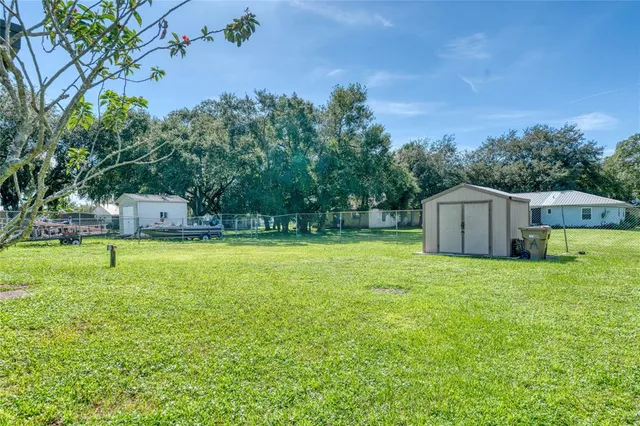 a house with swimming pool in front of it