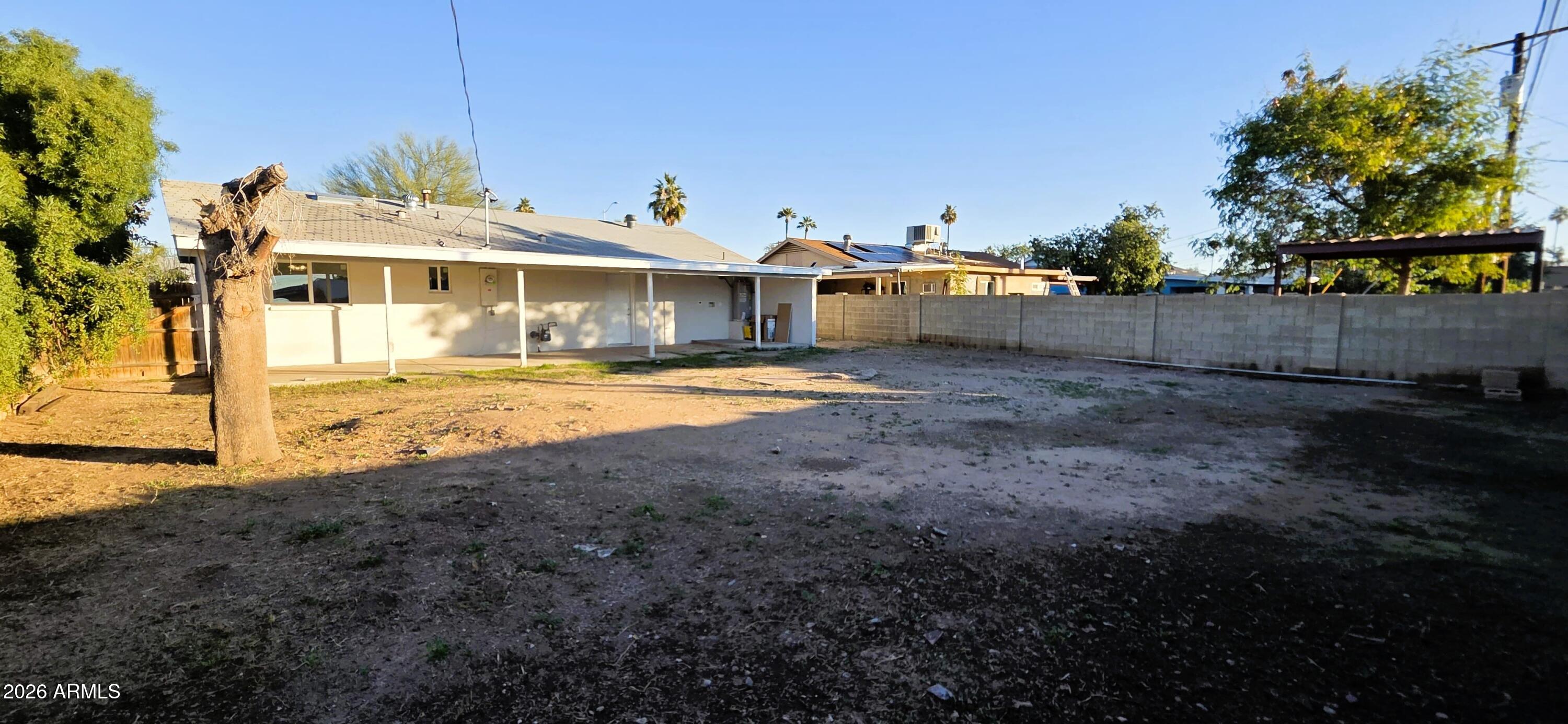 5721 West Cheery Lynn Road Phoenix, AZ 85031 - Photo 20 of 20 a front view of a house with a yard