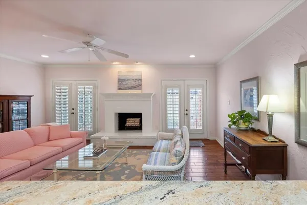 a living room with furniture rug and window