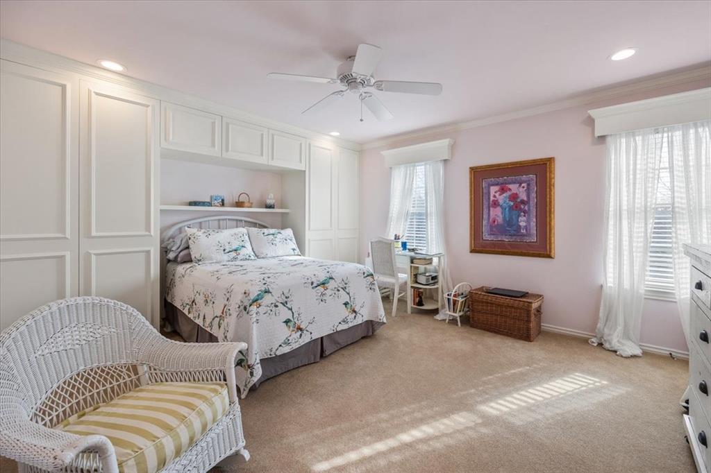 1109 Roaring Springs Road, Unit 1109 Fort Worth, TX 76114 - Photo 25 of 35 a bedroom with a bed and furniture