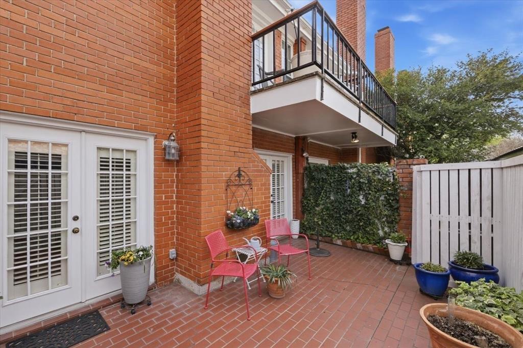 1109 Roaring Springs Road, Unit 1109 Fort Worth, TX 76114 - Photo 29 of 35 a view of a chairs with sitting area and wooden fence