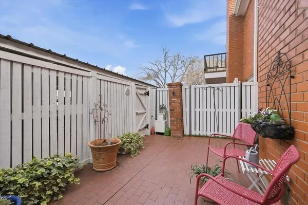 a garden view with a seating space