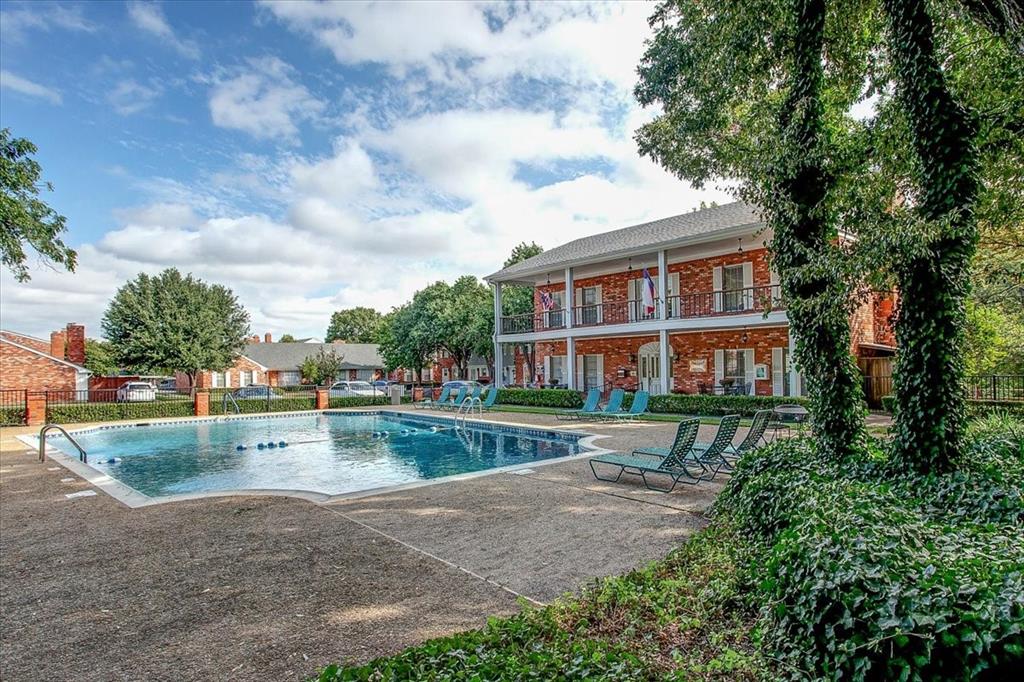 1109 Roaring Springs Road, Unit 1109 Fort Worth, TX 76114 - Photo 33 of 35 a view of backyard with dining table and chairs