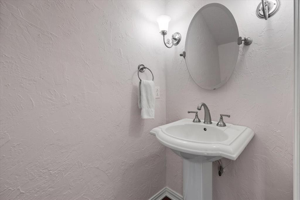 1109 Roaring Springs Road, Unit 1109 Fort Worth, TX 76114 - Photo 7 of 35 a bathroom with a sink and vanity