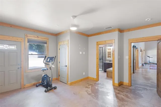 a view of a room with gym equipment