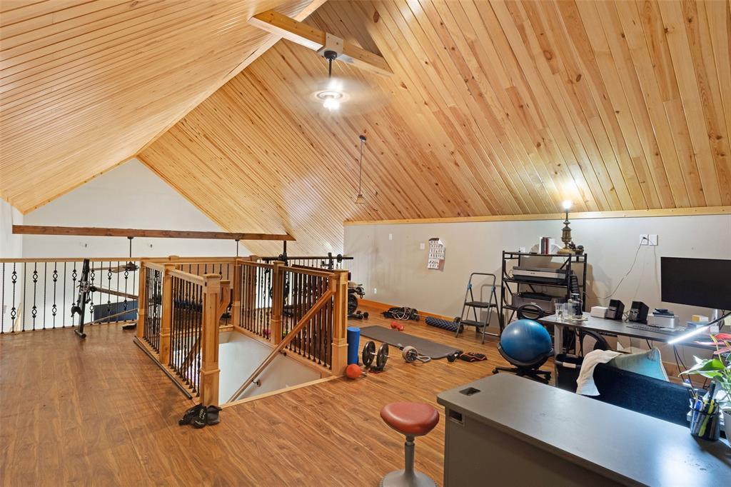 423 Hcr 1439 Covington, TX 76636 - Photo 25 of 40 a view of a room with gym equipment