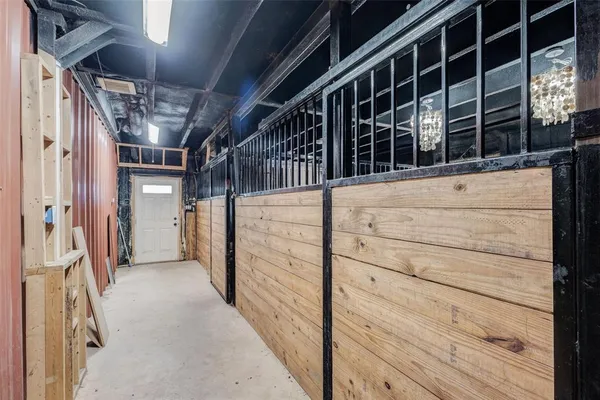 a view of a storage room with wooden floor