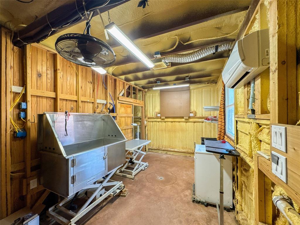 423 Hcr 1439 Covington, TX 76636 - Photo 33 of 40 a view of a storage room with wooden floor