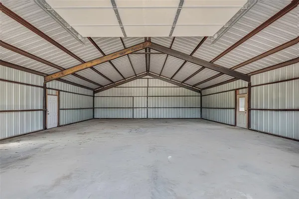 a view of a house with a snow in the yard