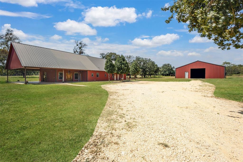 423 Hcr 1439 Covington, TX 76636 - Photo 5 of 40 a view of a house with a big yard