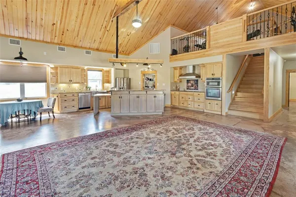 a living room with a rug