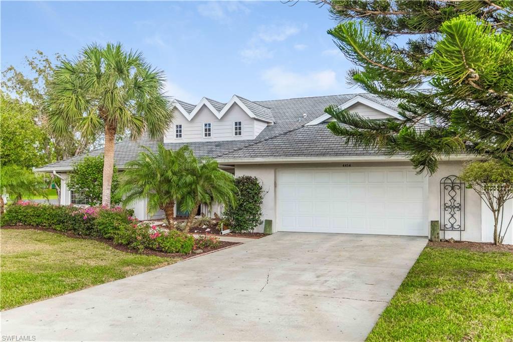 4454 Wilder Road Naples, FL 34105 - Photo 3 of 24 2-Car Garage With Front Porch