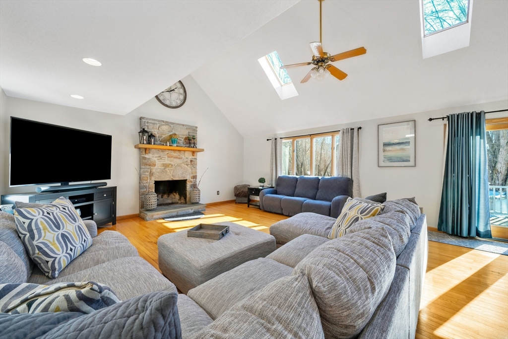 155 Monson Road Wilbraham, MA 01095 - Photo 9 of 40 a living room with furniture and a flat screen tv