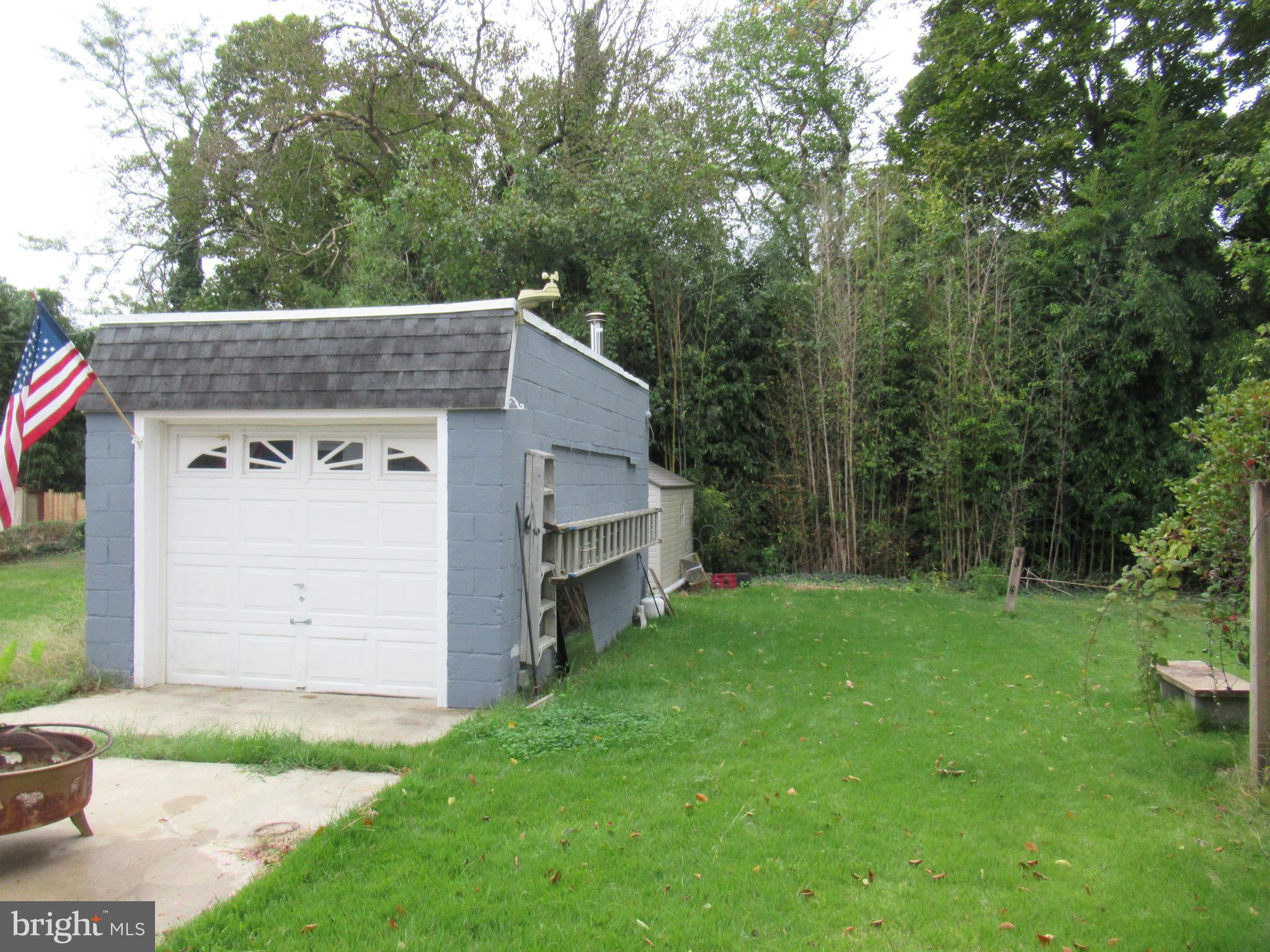 114 Cottman Avenue Cheltenham, PA 19012 - Photo 4 of 8 a view of a house with a backyard