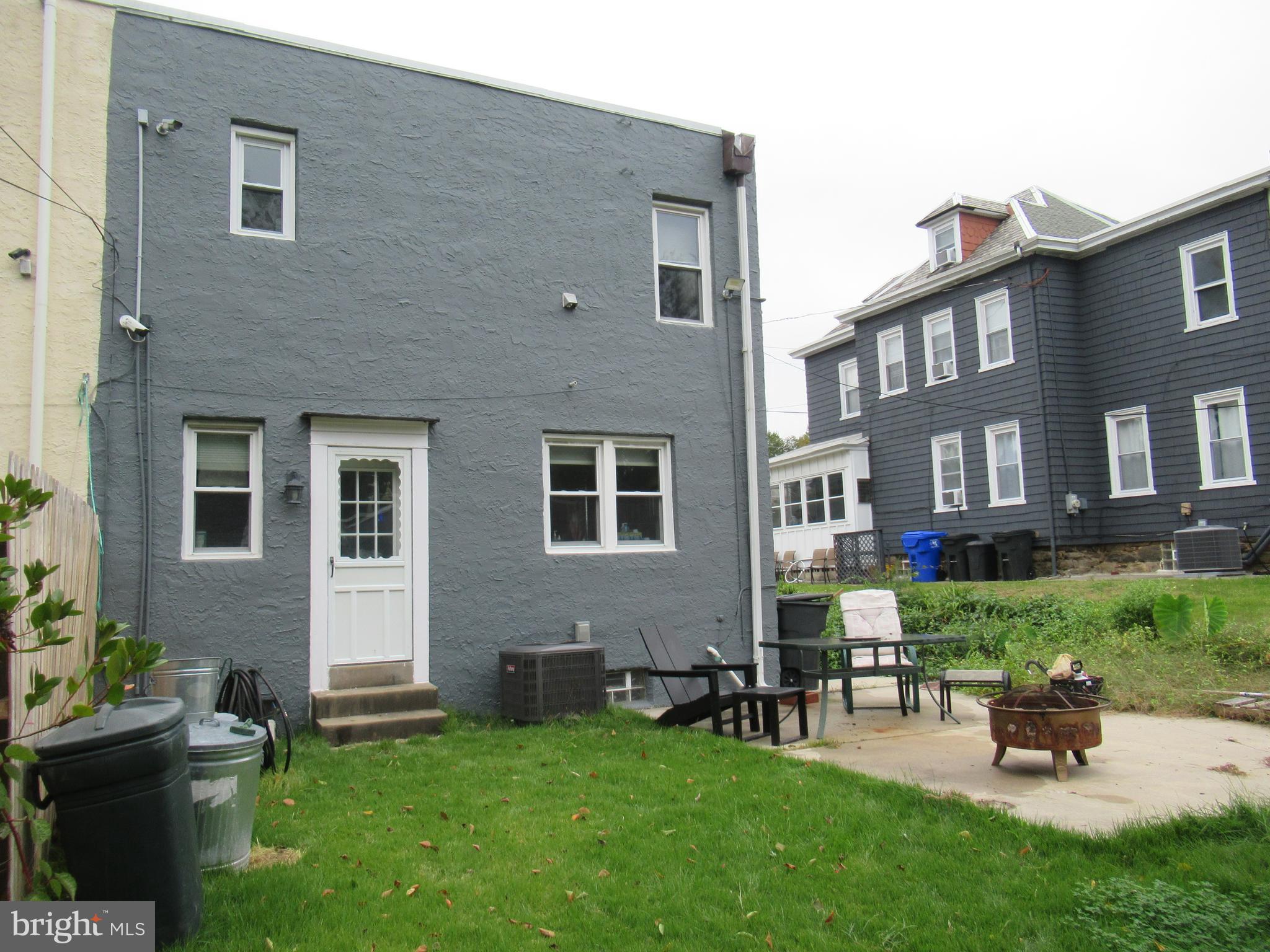 114 Cottman Avenue Cheltenham, PA 19012 - Photo 7 of 8 a view of a house with a yard and sitting area