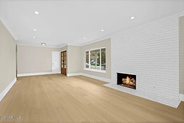 a view of a livingroom with a fireplace