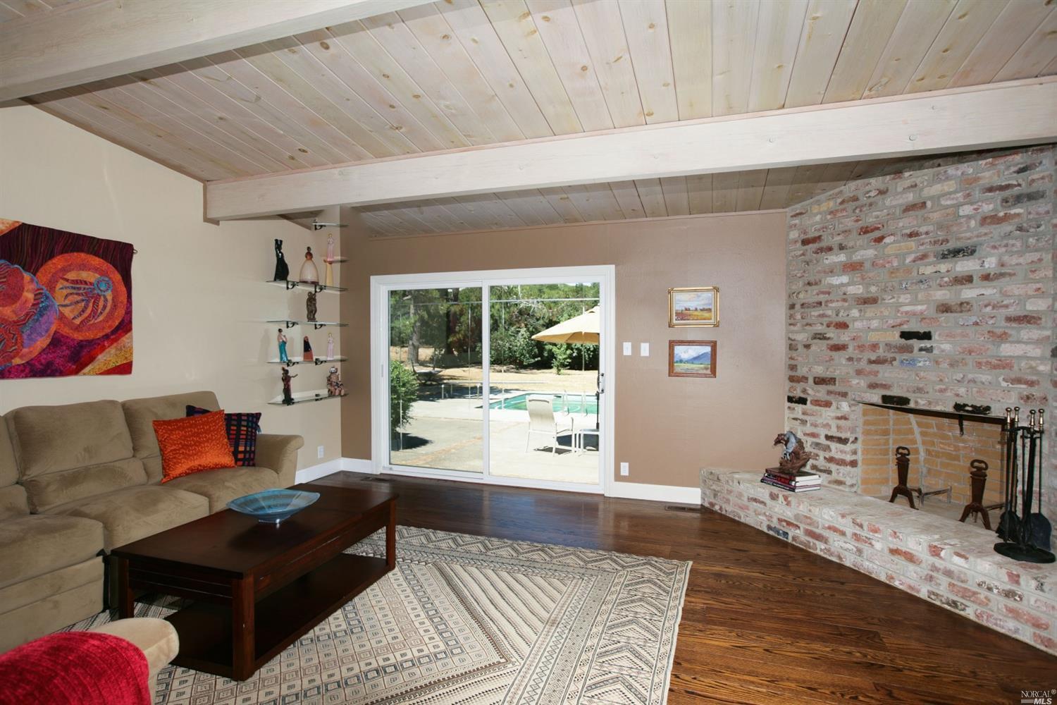 425 Indian Springs Road Novato, CA 94947 - Photo 1 of 1 a living room with furniture and a table