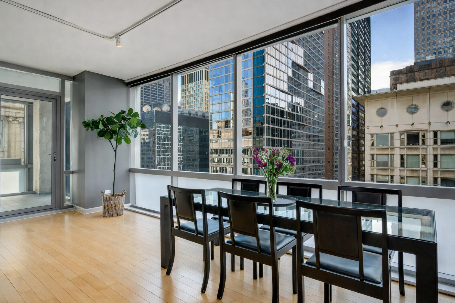 8 East Randolph Street, Unit 1208 Chicago, IL 60601 - Photo 7 of 27 a dining room with furniture and window