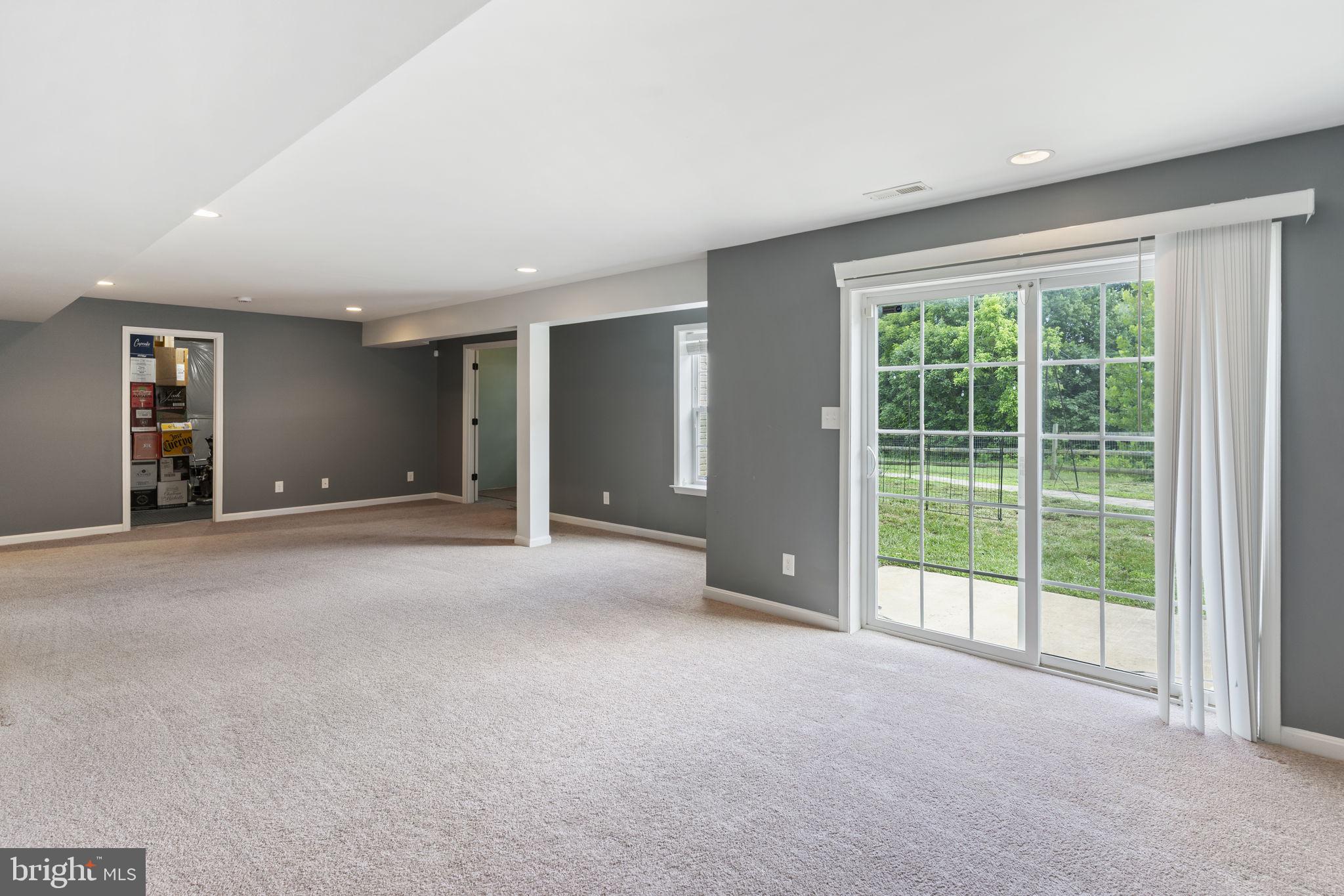 5270 Longbow Road King George, VA 22485 - Photo 61 of 75 Walk-out access to backyard from basement