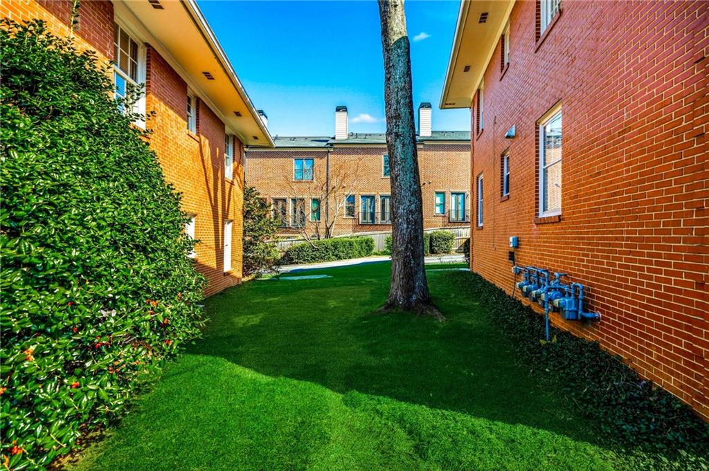 3694 Peachtree Road Northeast, Unit A4 Atlanta, GA 30319 - Photo 14 of 17 a view of yard from deck
